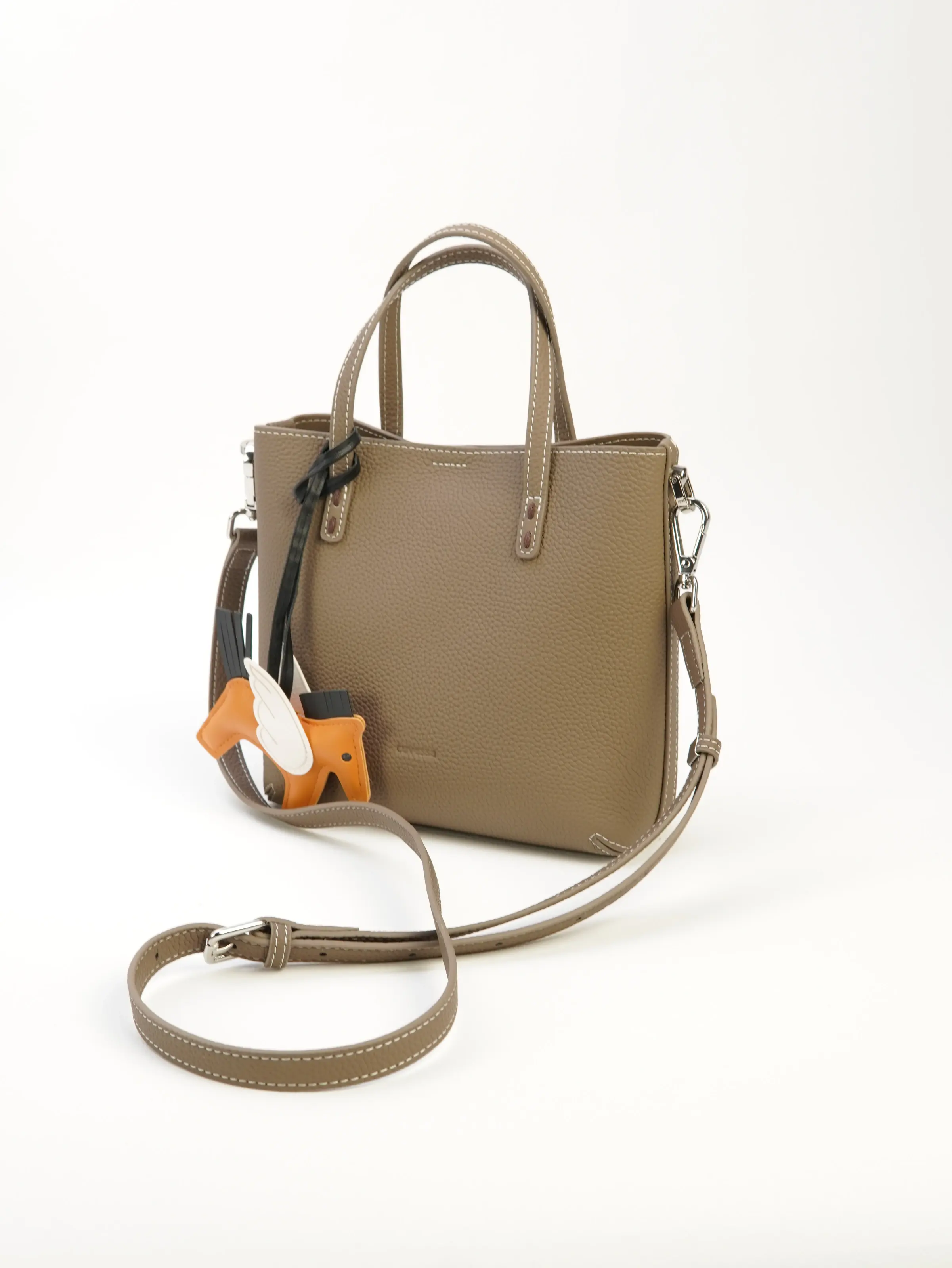 Lena taupe top-handle tote bag with the longer strap attached at the sides