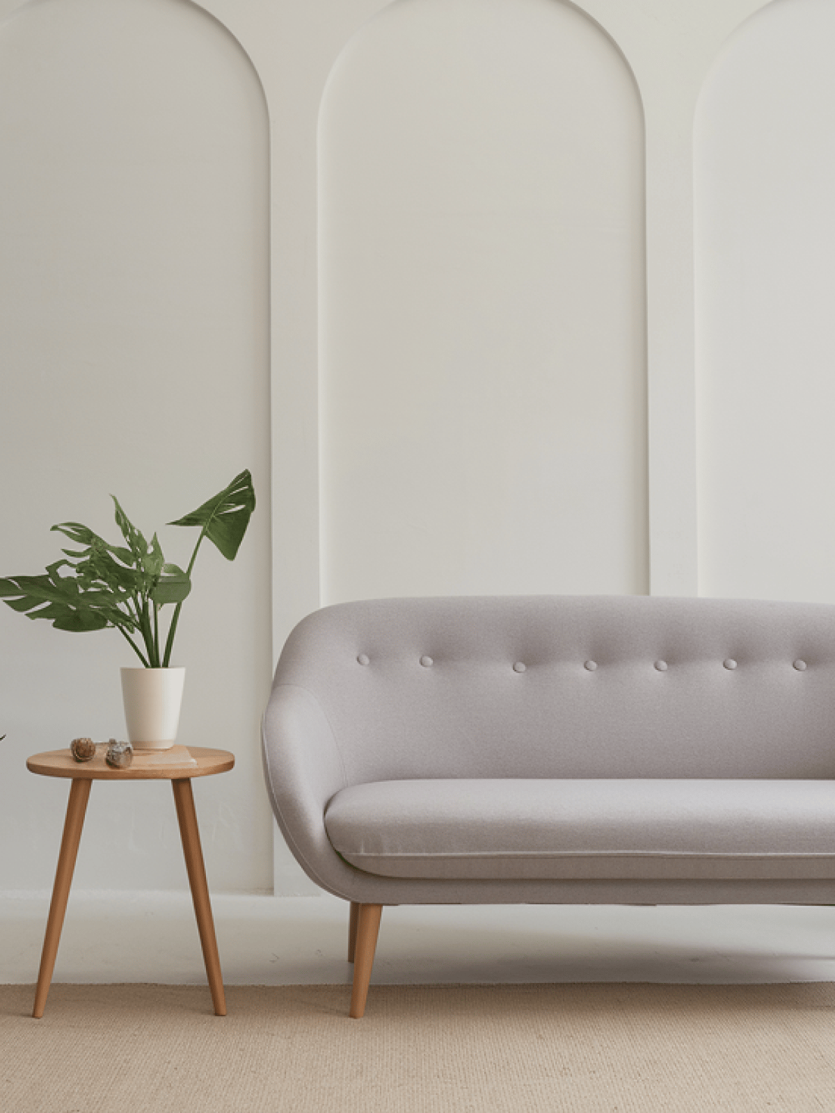 Gray one-seater sofa and wooden coffee table